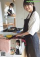 A woman in an apron preparing food in a kitchen.